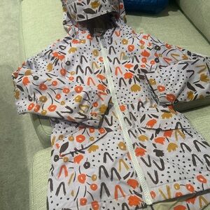 REI hooded rain jacket floral size 4/5
